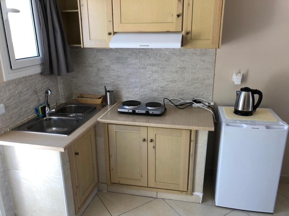 Petros Rooms & Apartments Ликсури Экстерьер фото